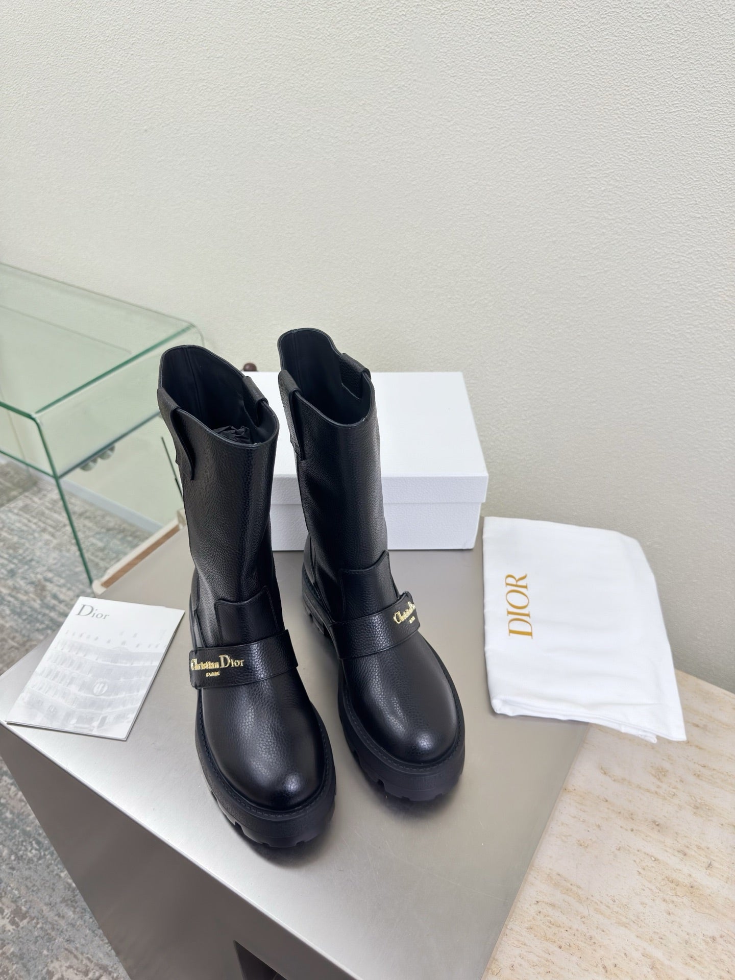 Dior ladies mid-calf leather boots, dark with pull-on design and chunky rubber sole