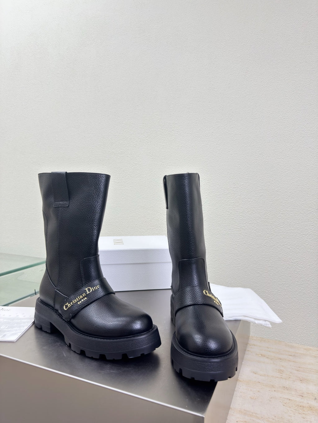 Dior ladies pair of mid-calf leather boots in dark, thick lugged sole