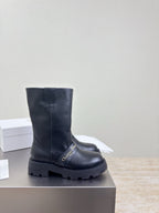 Dior ladies side view mid-calf boots in dark leather with rugged lug sole