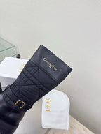 Women's black quilted mid-calf boots with gold buckle and Christian Dior logo