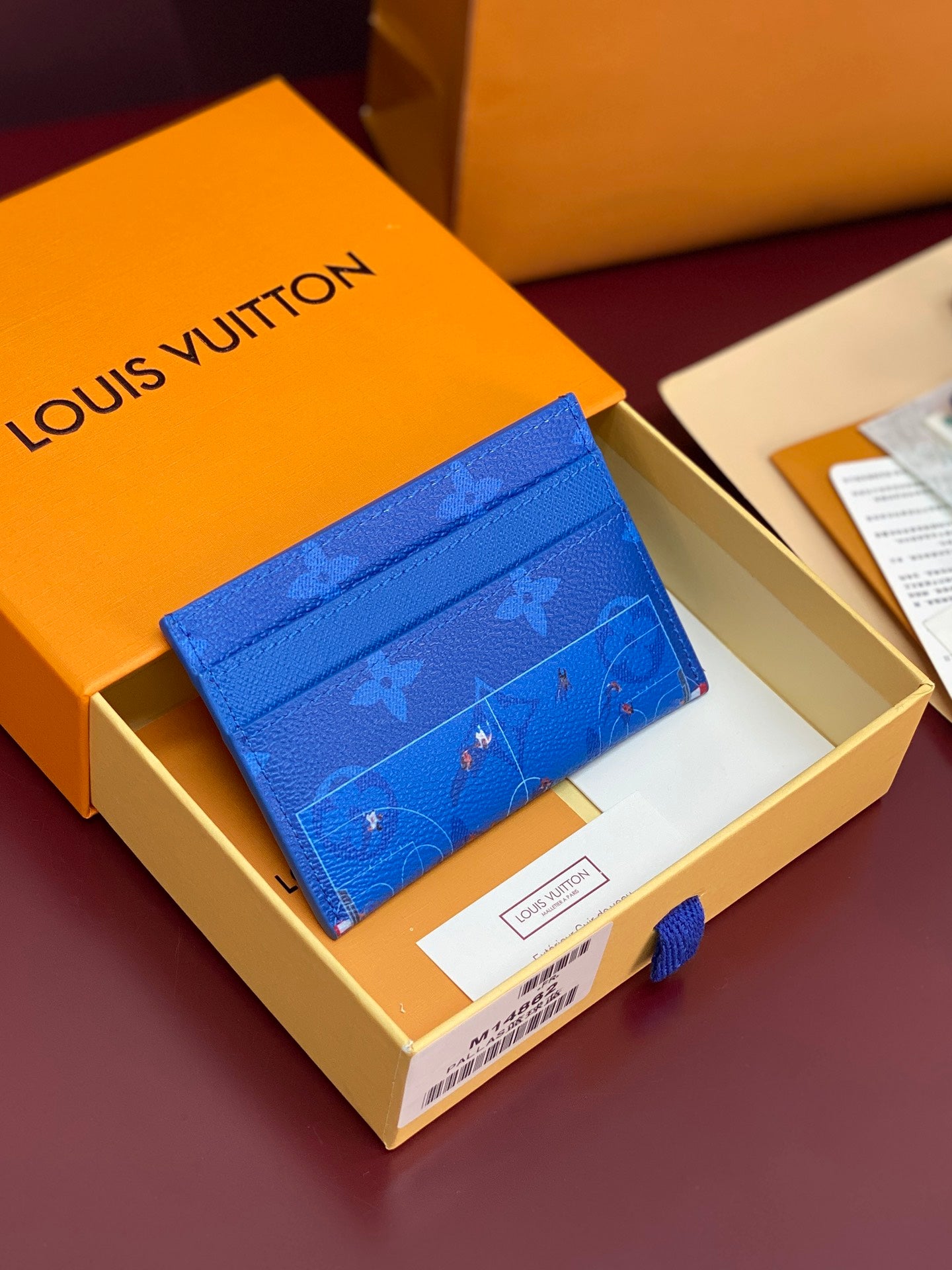 Louis Vuitton small bag in blue with repeating monogram pattern, in gift box