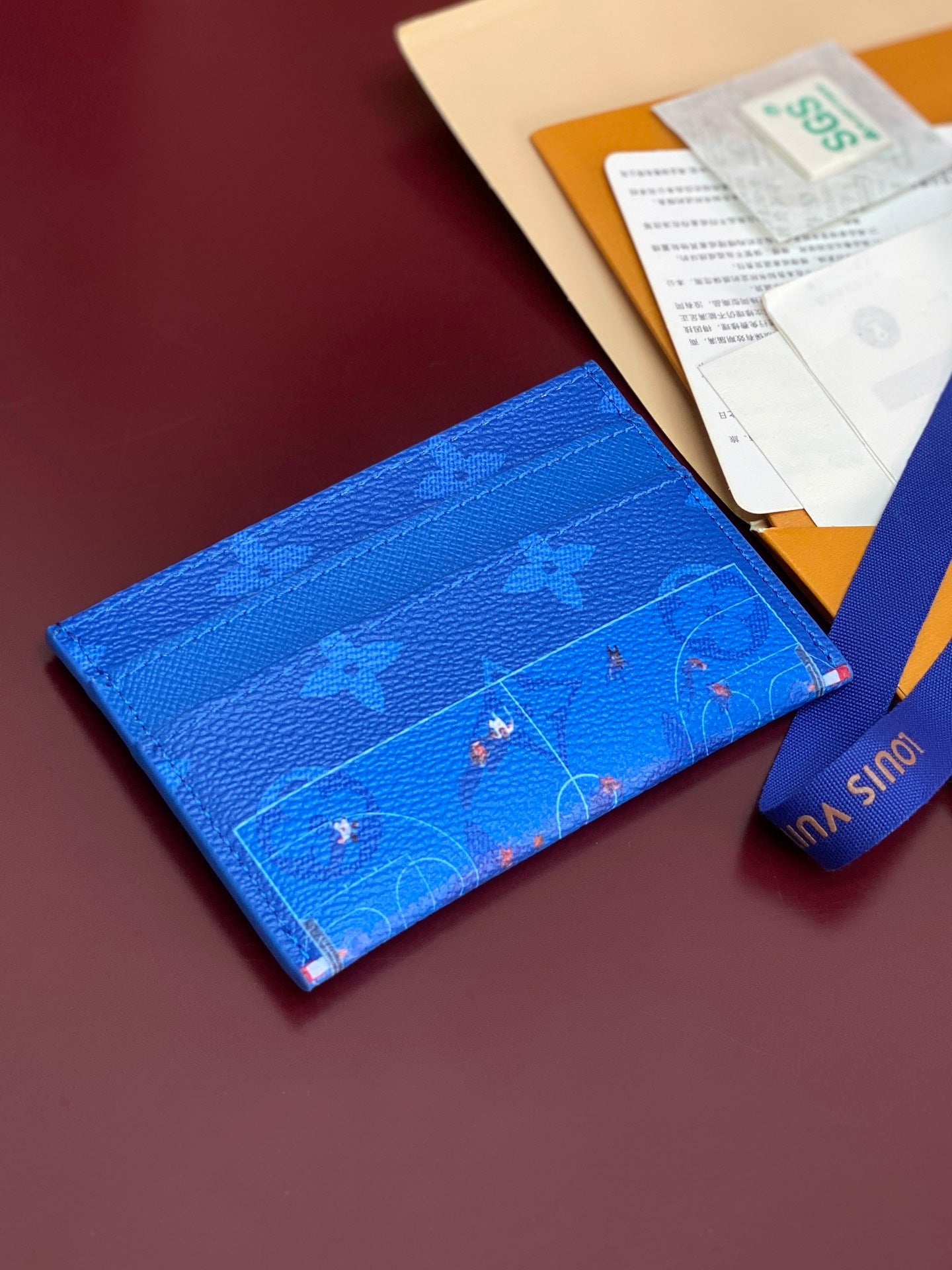 Louis Vuitton small bag in blue monogram leather with blue wrist strap