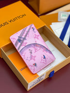 Pink Louis Vuitton small bag with Eiffel Tower and tropical birds print.