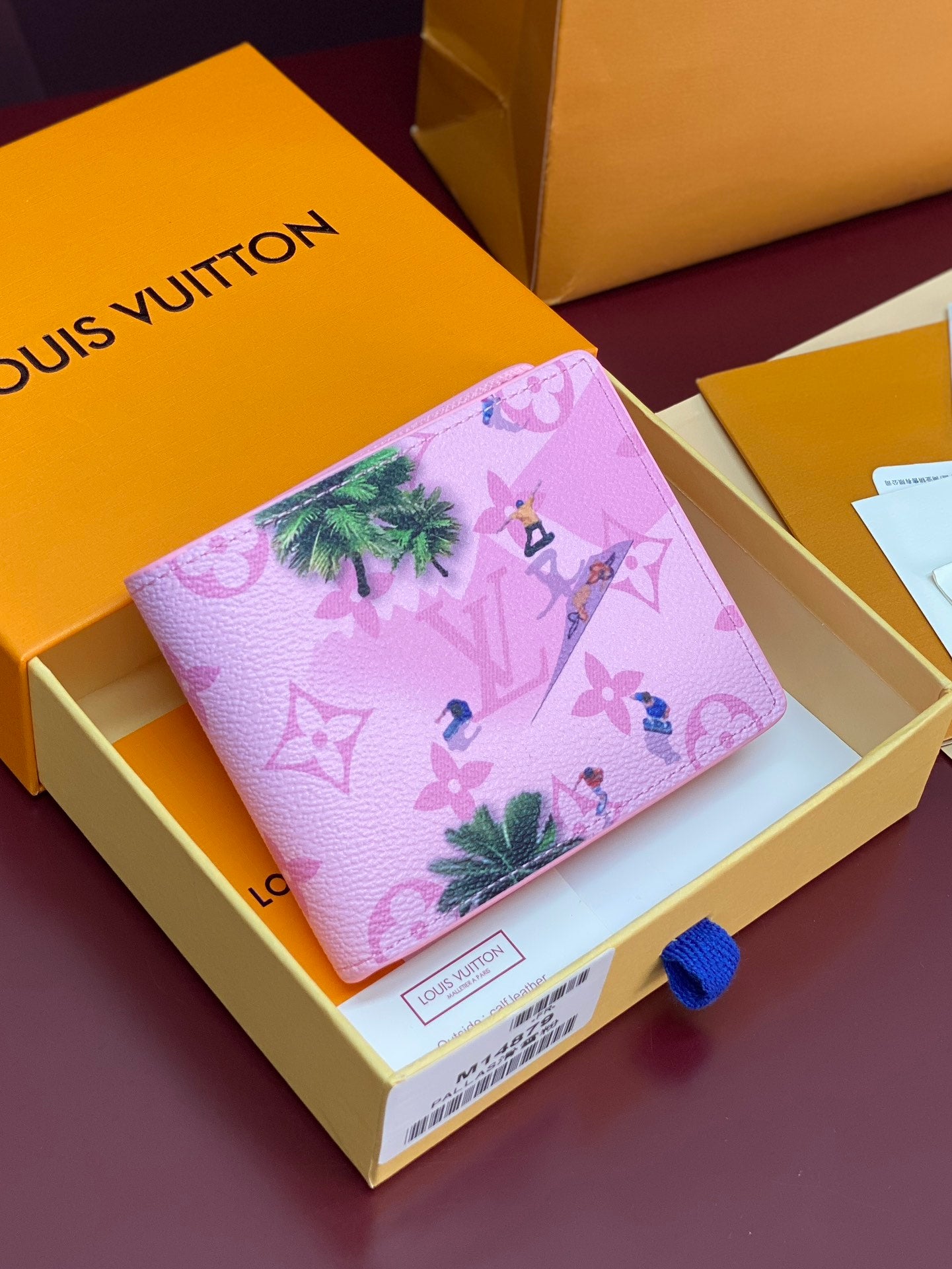 Pink textured small bag with Louis Vuitton monogram and multicolor character print