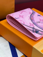 Pink rolled small bag with multicolor Louis Vuitton monogram print