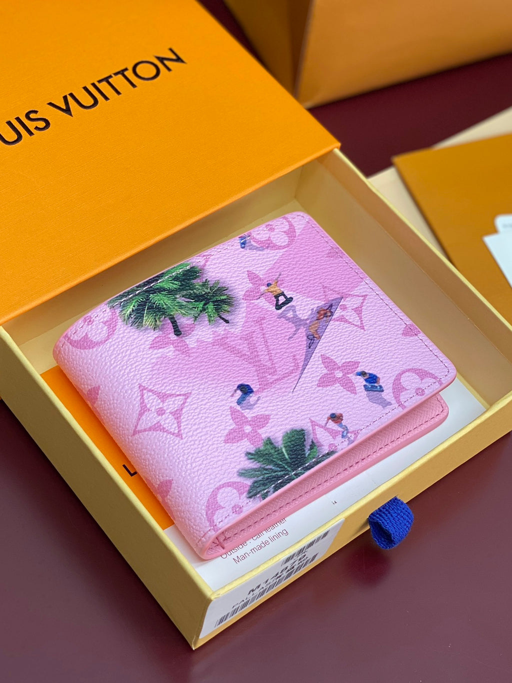 Pink flap small bag with tropical character print and Louis Vuitton monogram