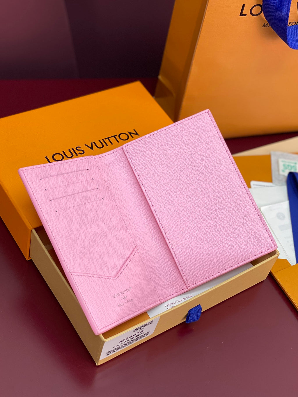 Pink small bag wallet-style with fold-over flap and card slots
