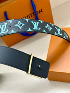 Louis Vuitton belt with dark navy strap, turquoise monogram trim, and gold-tone buckle