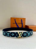 Louis Vuitton belt with dark navy strap and turquoise monogram pattern, gold buckle