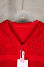 Red knit hoodie neckline and front zipper, close-up of hood opening