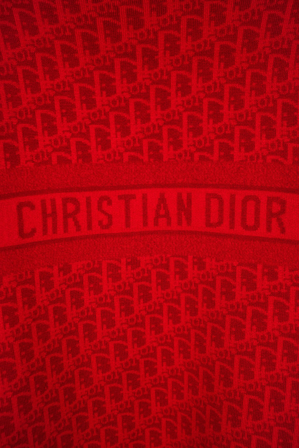 Red knit logo panel with CHRISTIAN DIOR lettering