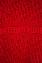 Red knit logo panel with CHRISTIAN DIOR lettering