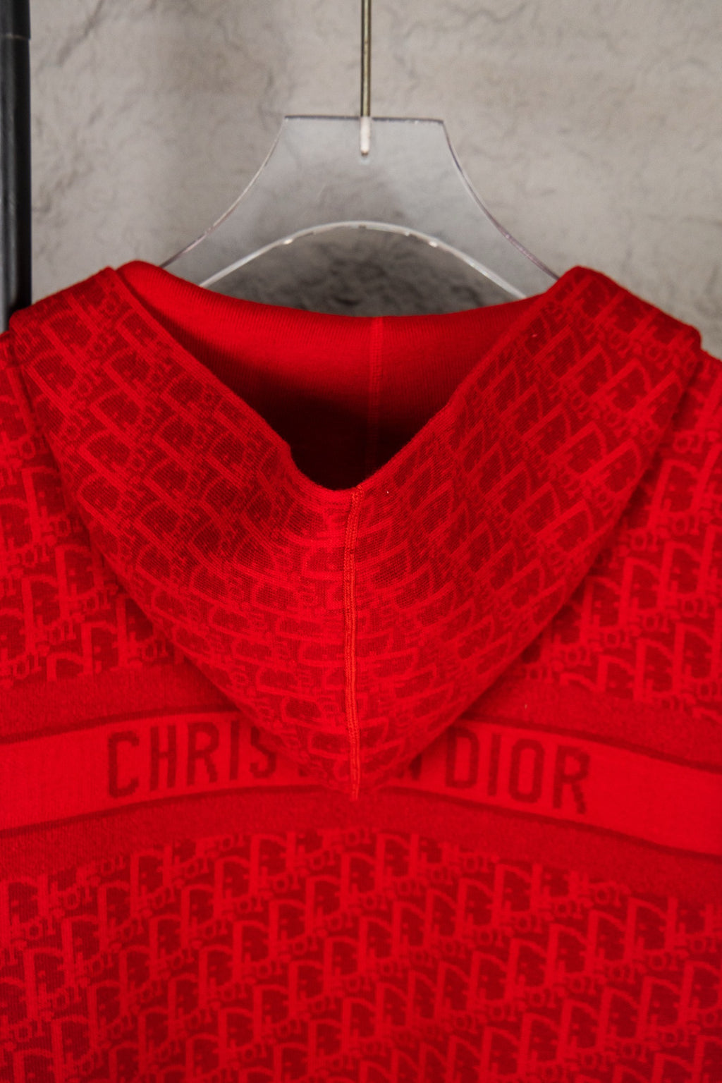 Red knit hoodie neckline with allover logo and CHRISTIAN DIOR band