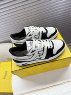 White and black lace-up low-top sneakers with FENDI logo patches, top view