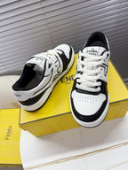 White and black lace-up low-top sneakers with FENDI logo, angled pair view