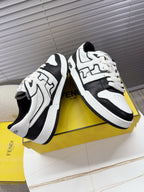 White and black lace-up low-top sneakers with FENDI logo, side and toe view