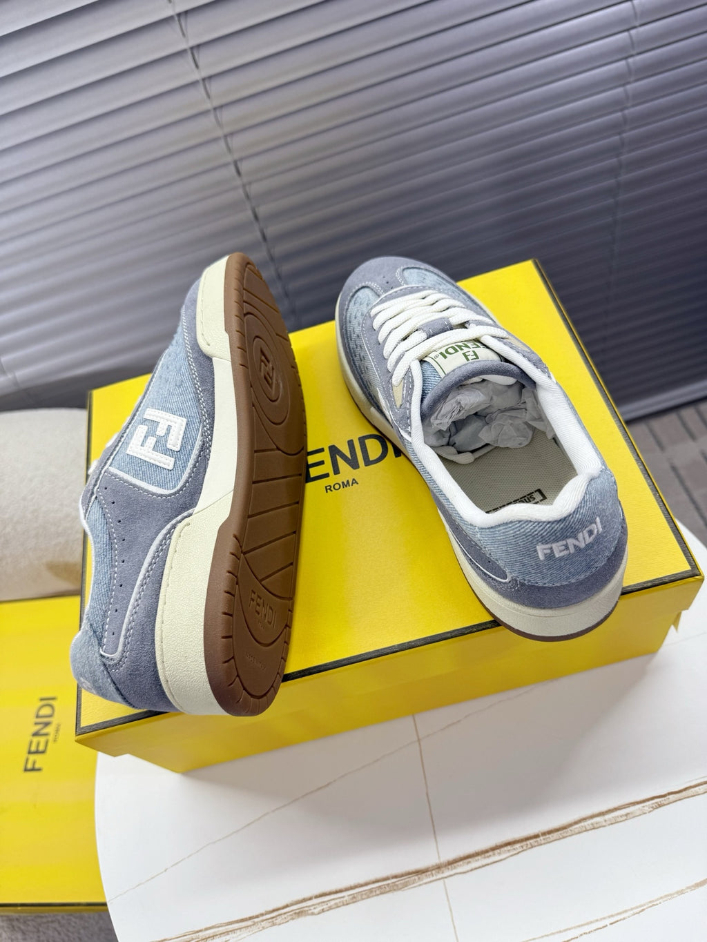 Fendi unisex sneakers, gray uppers with white laces, side logos and off-white outsole