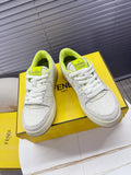 Fendi unisex sneakers: white low-top lace-up with neon green collar and Fendi Roma patch