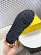 Rubber outsole for Fendi sneakers, dark tread pattern with Fendi logo center.