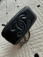 Chanel quilted clutch bag with embossed CC logo, black leather finish