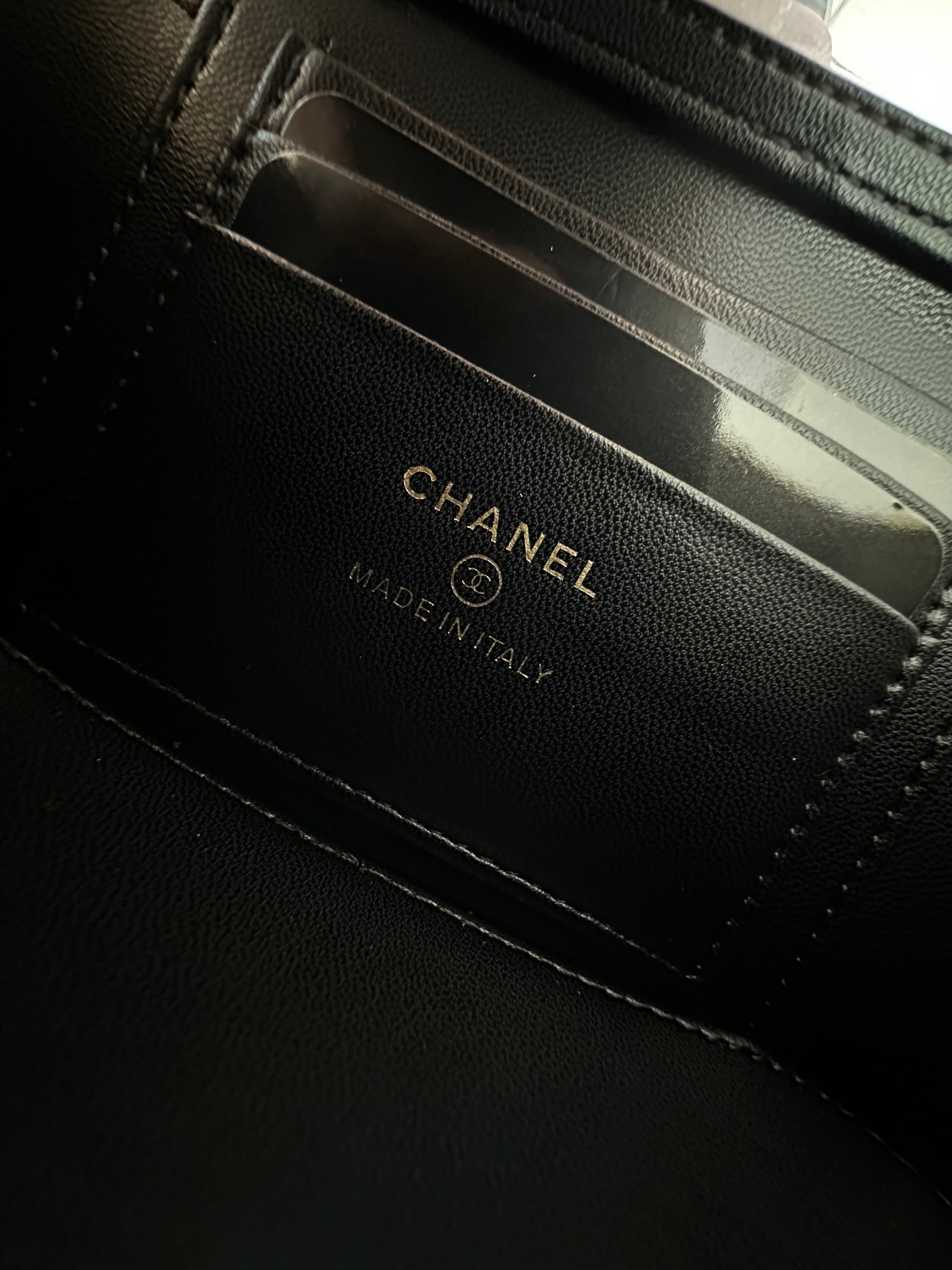 Chanel bag interior leather label with CHANEL and MADE IN ITALY text
