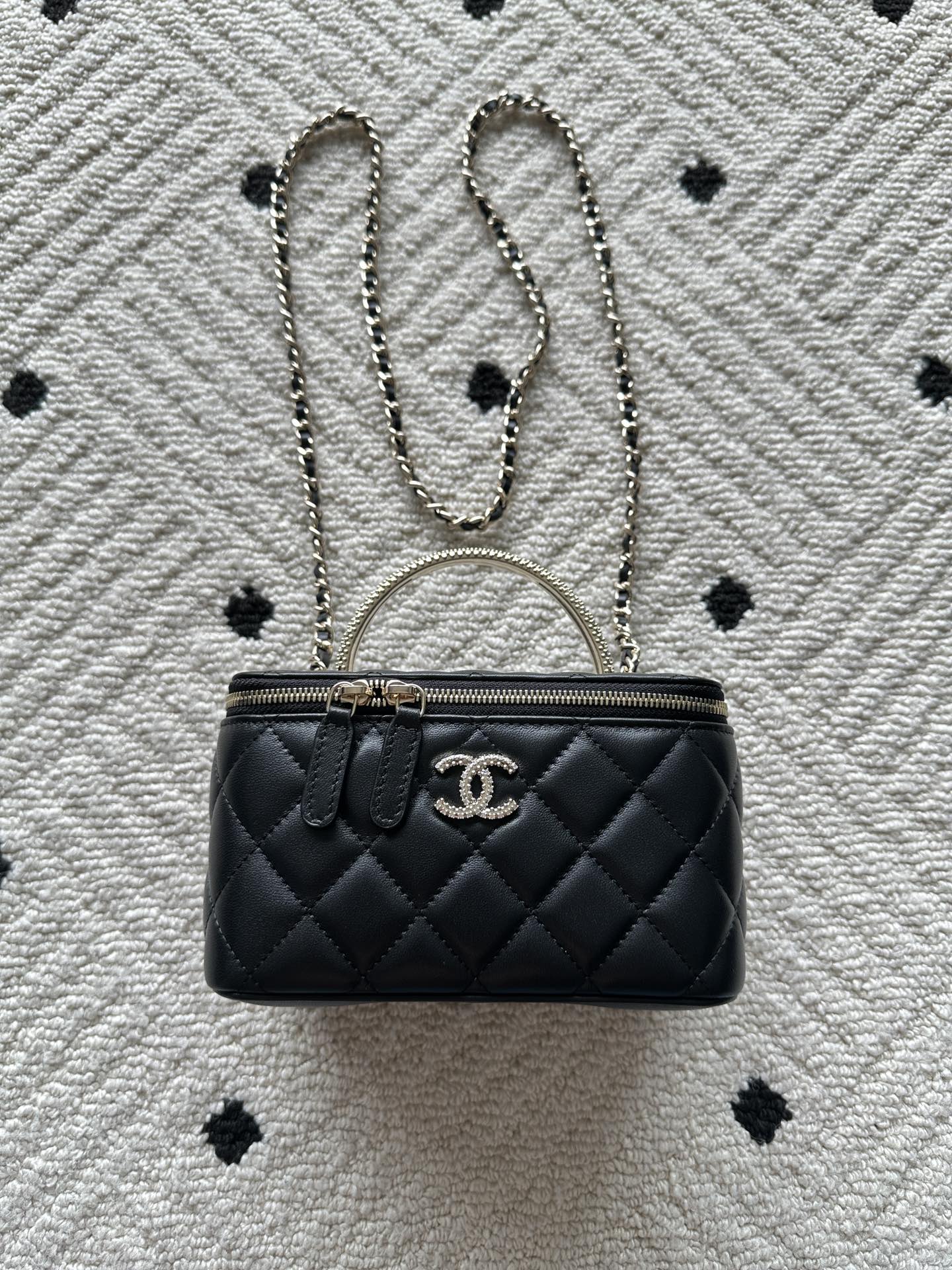 Chanel quilted bag with chain strap, round top handle, black finish