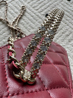 Chanel quilted mini bag detail, burgundy leather with crystal chain strap trim