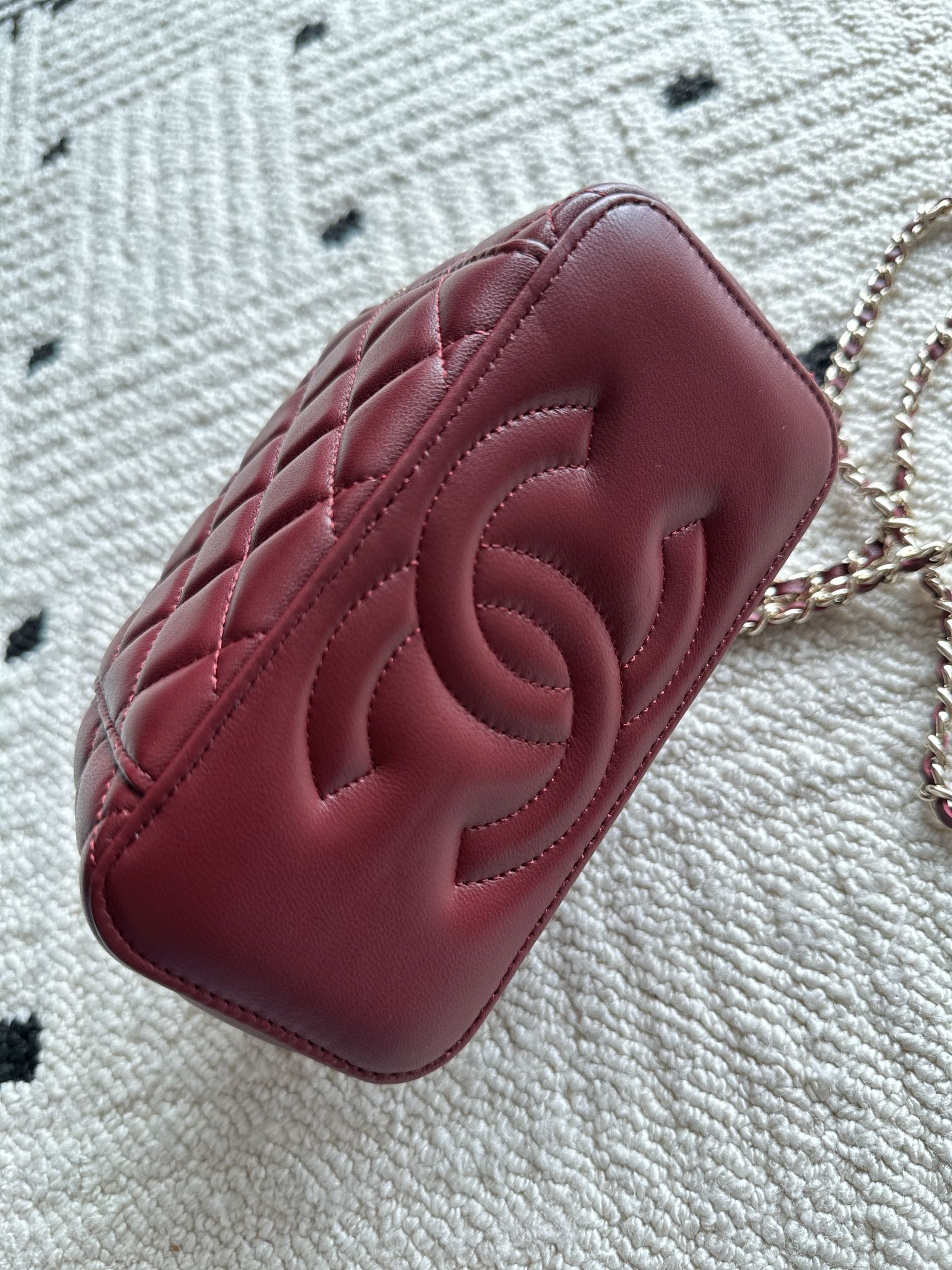 Chanel quilted mini bag, burgundy leather with embossed CC logo on front