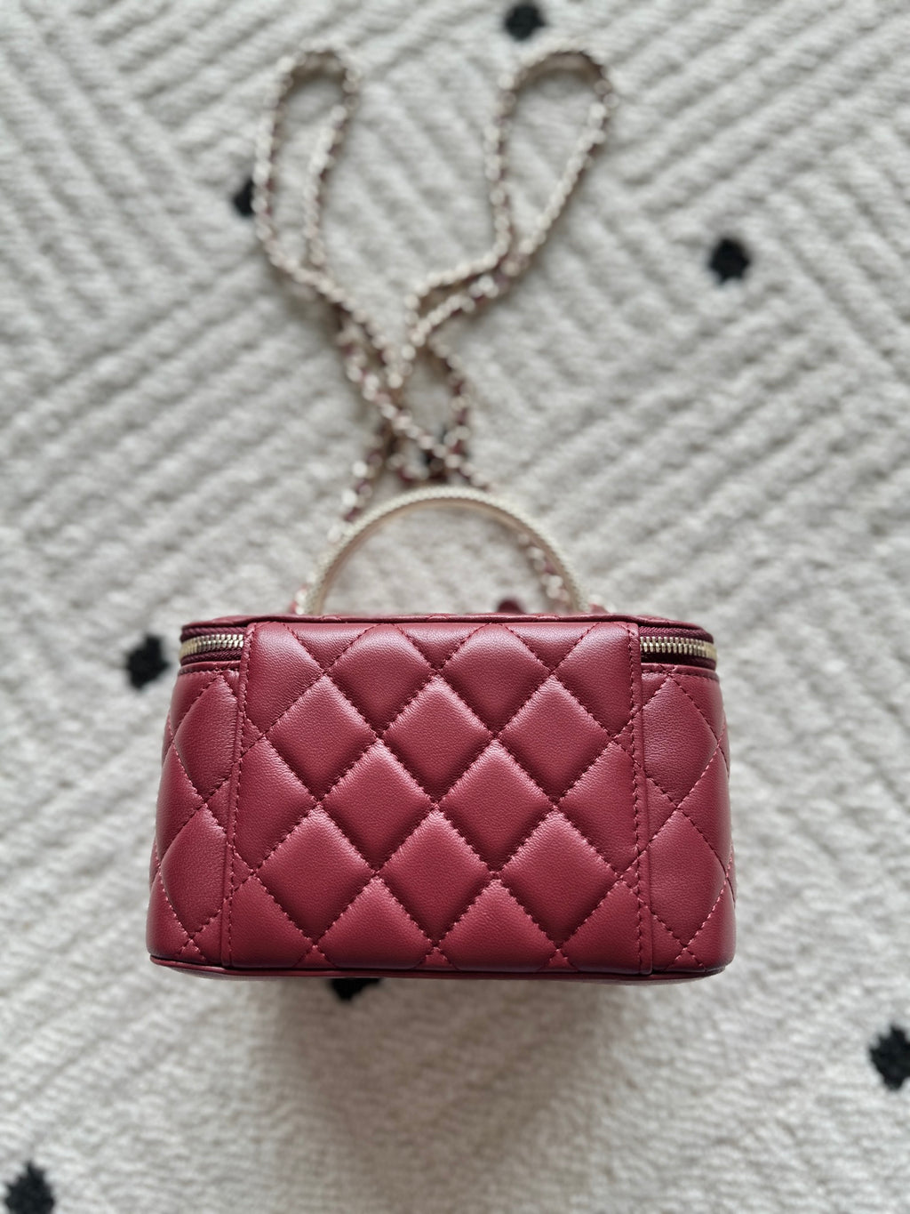 Chanel quilted mini bag with top zip, burgundy leather and hanging chain strap