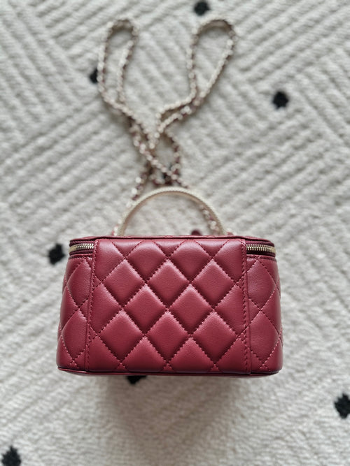 Chanel quilted mini bag with top zip, burgundy leather and hanging chain strap