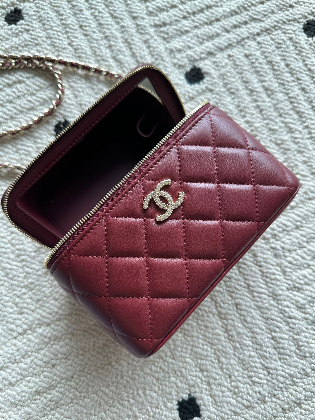 Chanel quilted mini bag open top, burgundy interior with zip closure