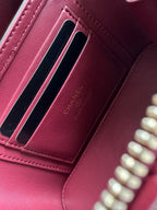 Chanel quilted mini bag card slot, burgundy leather with CHANEL stamped branding