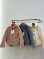 Long-sleeve zip fleece jacket with hood, taupe, on a hanger