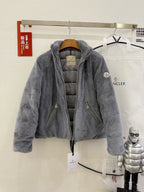 Gray hooded zip fleece jacket with two front pockets, hanging on a hanger