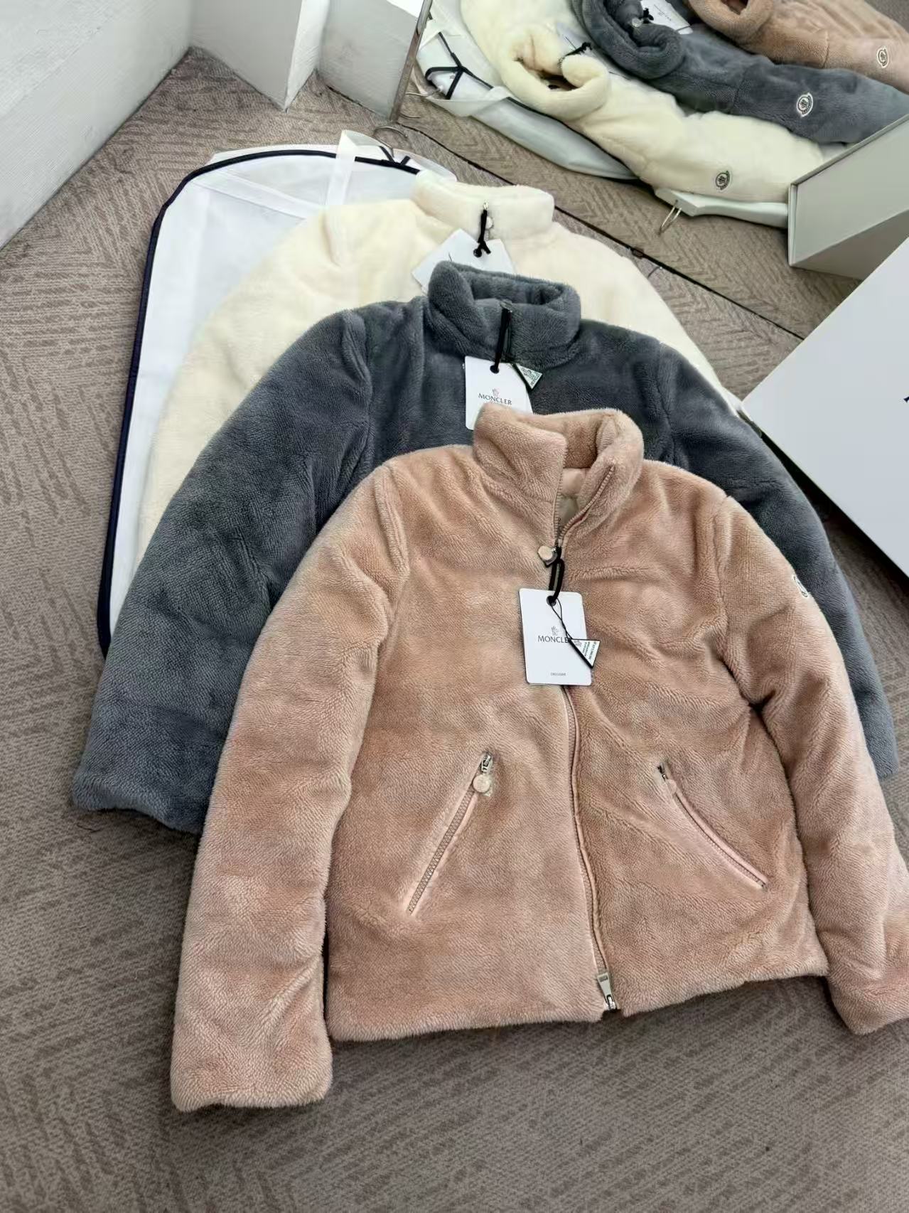 Zip fleece jacket with hood, light taupe and dark gray, laid flat