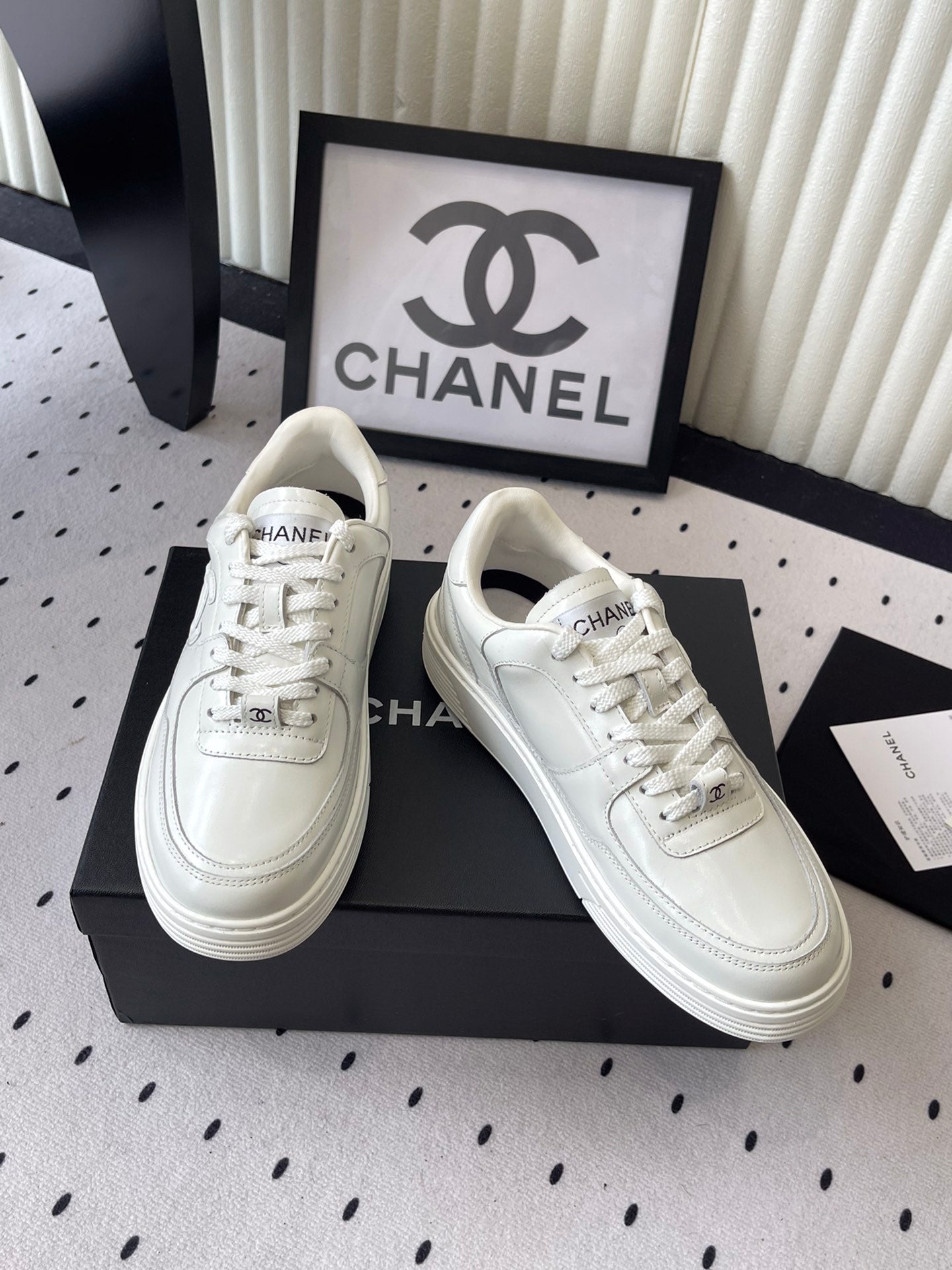 White leather lace-up sneakers, pair with Chanel CC logos on sides