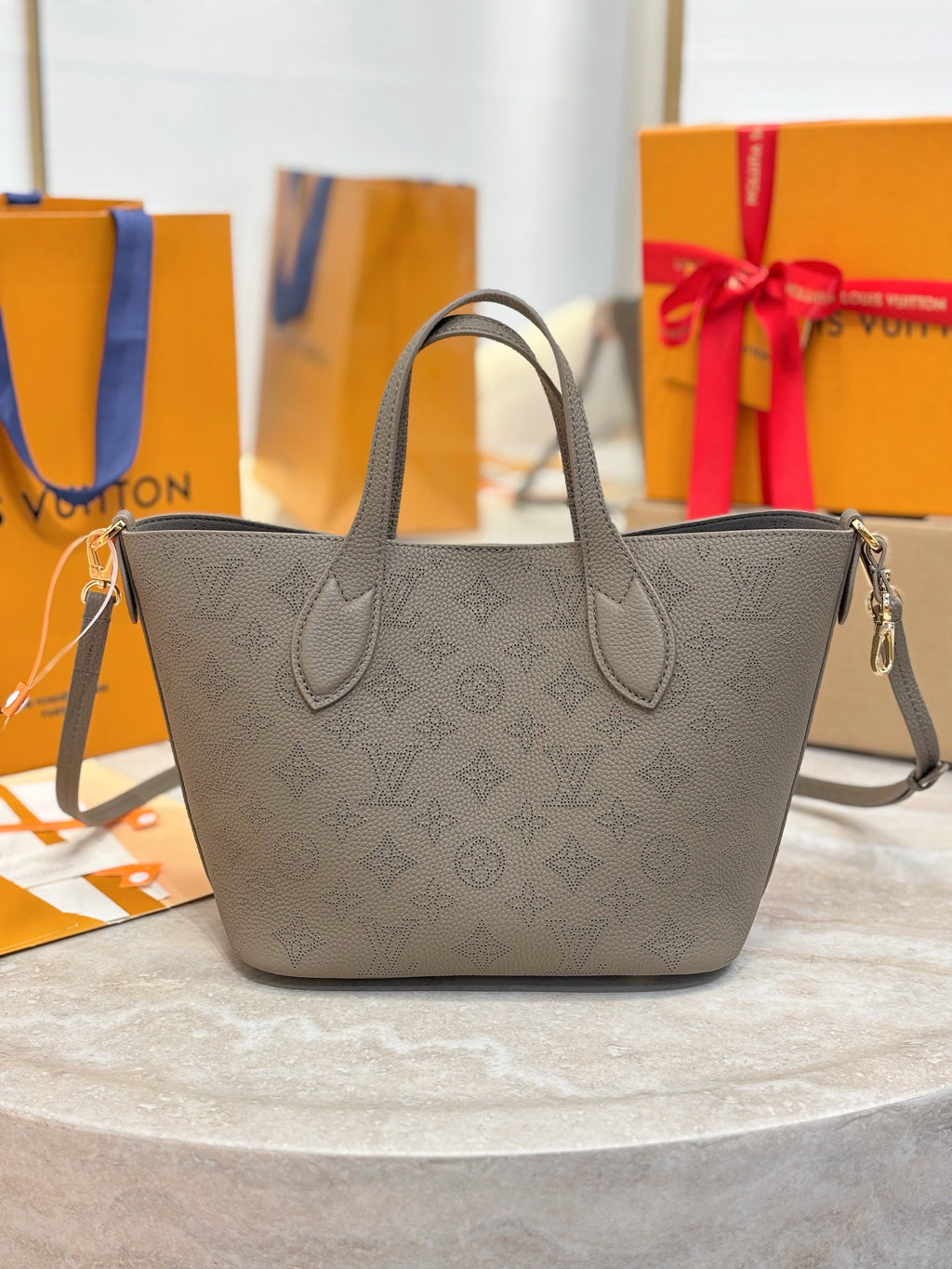 Louis Vuitton gray monogram tote bag with shoulder strap, front view