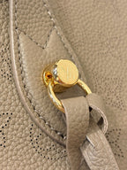 Louis Vuitton gold-tone clasp on gray leather strap