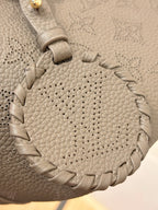 Louis Vuitton gray leather texture with stitched woven trim detail