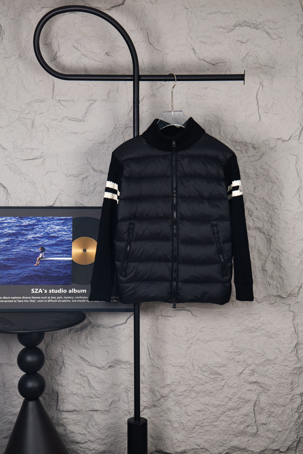 Moncler long puffer jacket, black zip front and ribbed collar, striped cuffs