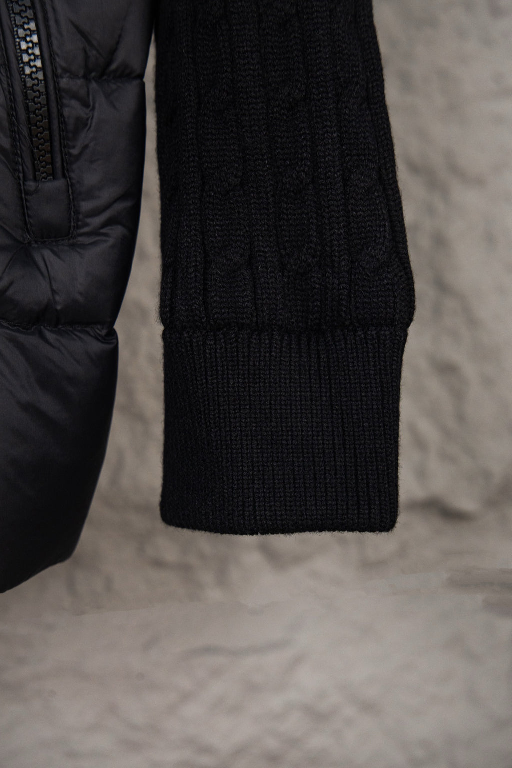 Moncler puffer jacket lower sleeve and knit cuff, dark quilted fabric