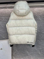 Cream long puffer jacket back view with hood, quilted construction, straight hem