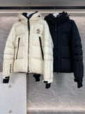 Cream long puffer jacket with hood, front zip, black inner accents, flap pockets