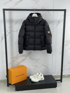 Moncler black hooded down jacket with full-zip front and quilted padding