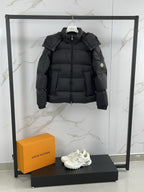 Moncler black hooded down jacket with full-zip front and logo badge detail