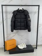 Moncler black hooded puffer jacket with full-zip front and logo sleeve patch