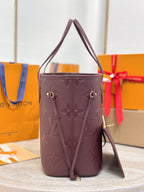 Louis Vuitton monogram bucket bag in dark plum with shoulder strap and gold buckles