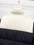 Two-tone puffer jacket back with high collar, white upper and dark panel