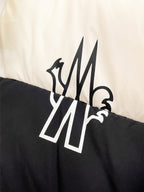 Moncler logo on two-tone puffer jacket, white and dark