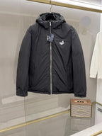 Long black puffer jacket with hood, front zipper and small chest logo patch